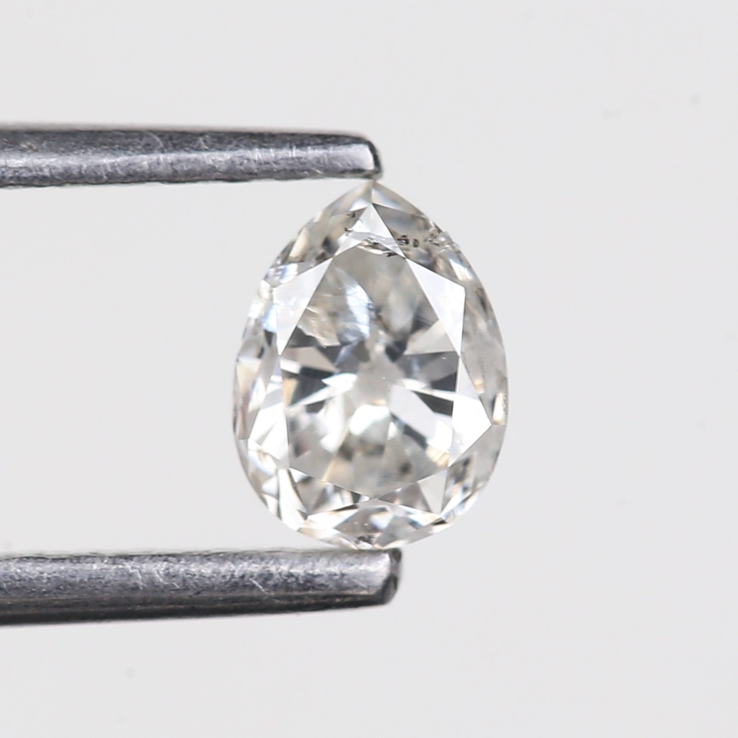 0.49 Carat Natural Pear Salt and Pepper Diamond 5.35 MM