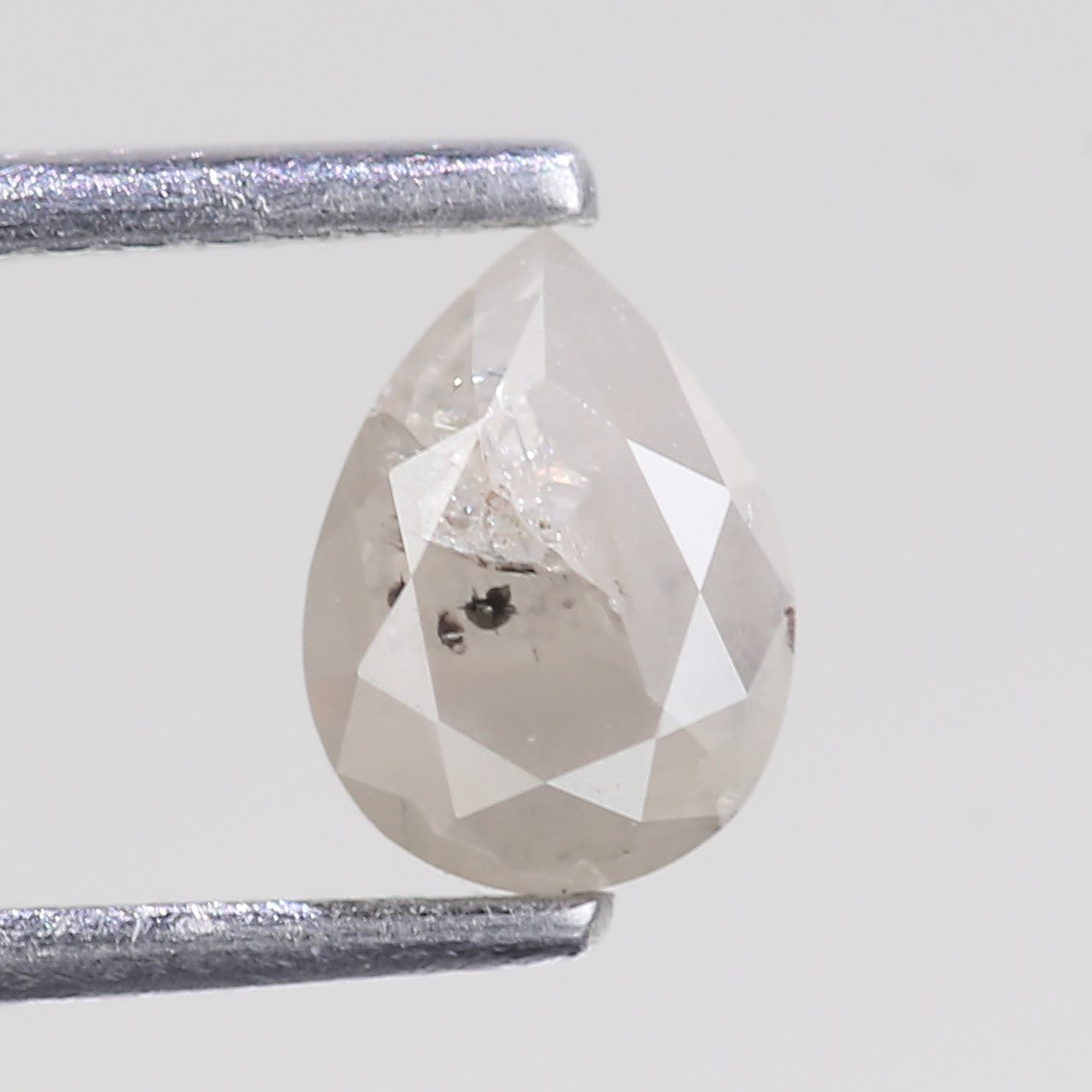 0.76 Carat Natural Icy Grey Pear Salt And Pepper Diamond 6.82 MM
