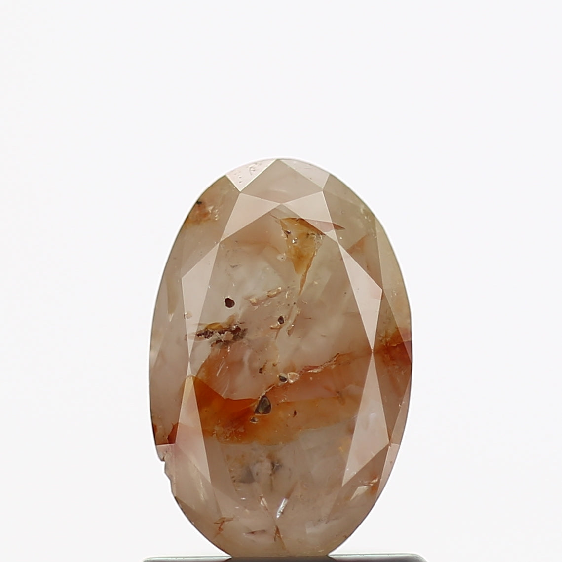 0.84 Carat Oval Brilliant Cut Orange Rustic Diamond