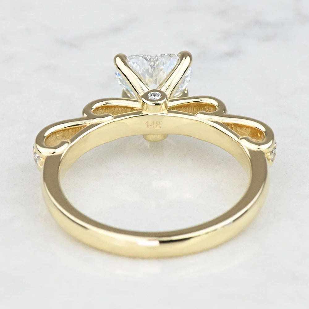 Gold ring with a diamond on a light gray background 14K GOLD