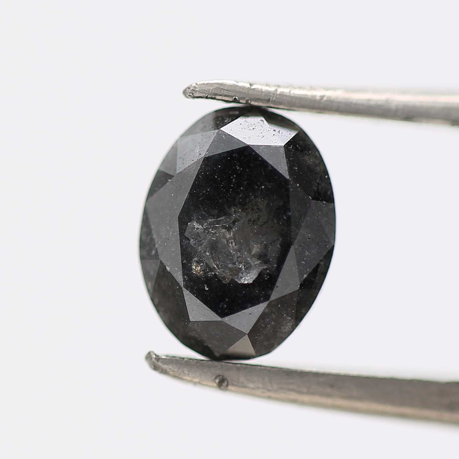 1.07 Carat Black Oval Shape Salt and Pepper Diamond 7.12 MM
