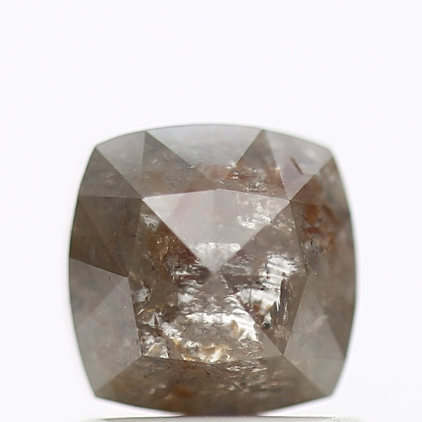 Faceted brown diamond on a white background