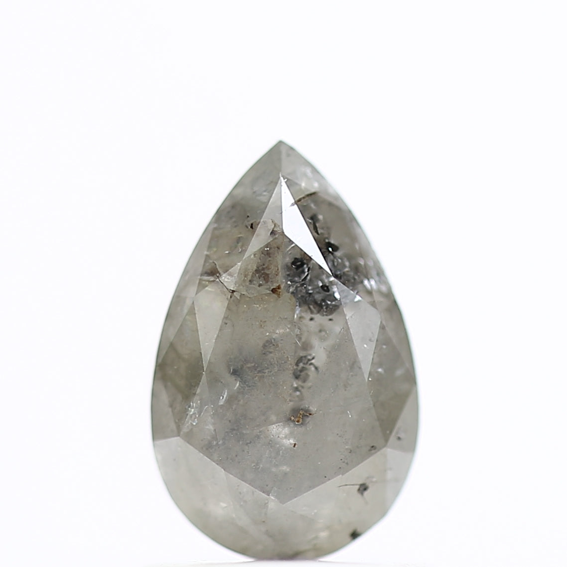 Teardrop-shaped diamond on a white background