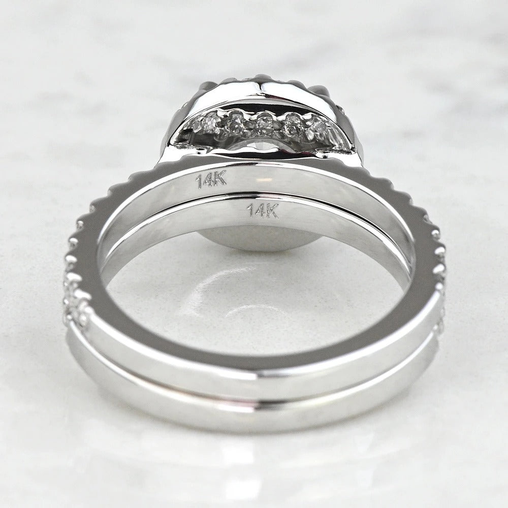 white gold ring with '14K' marking on a light gray background