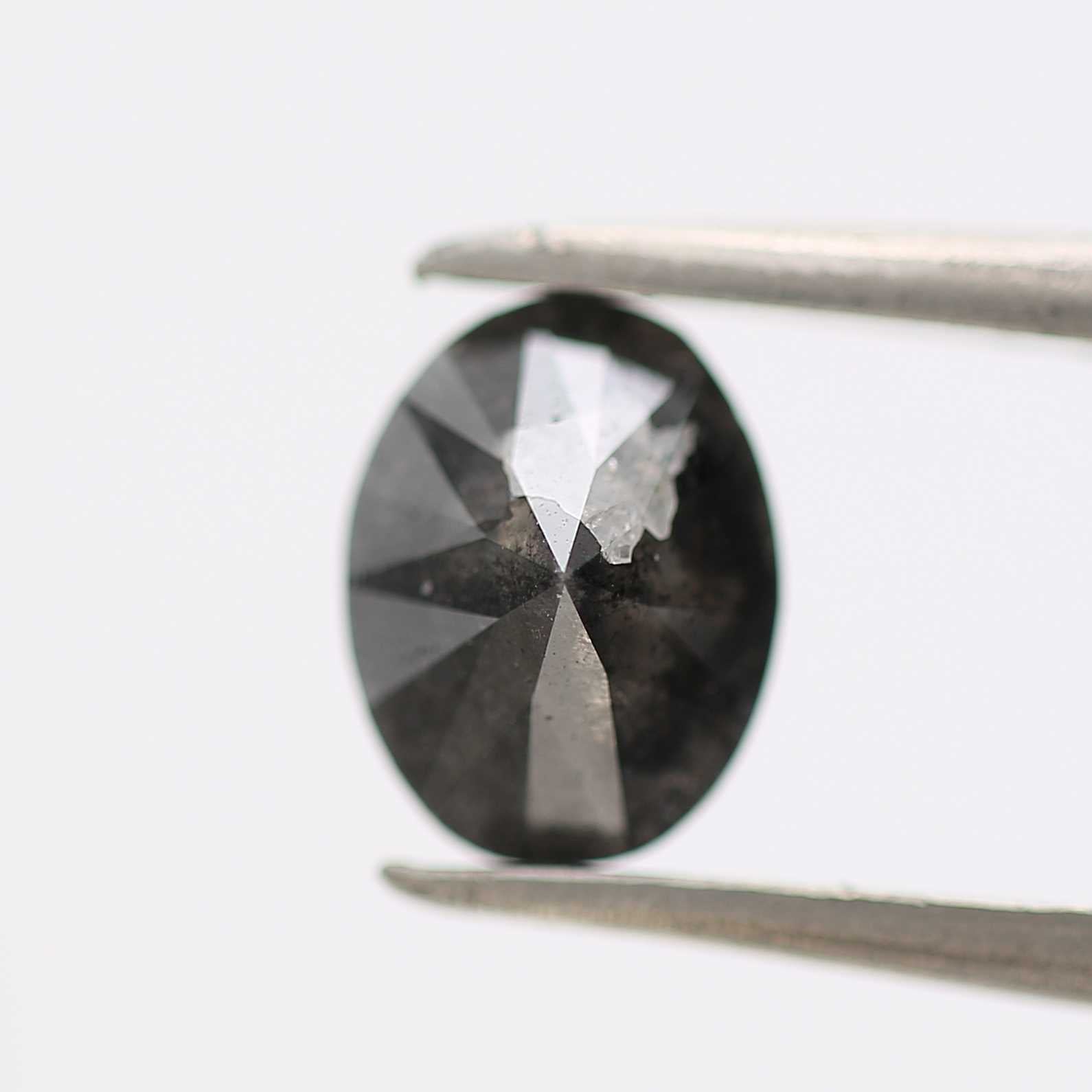 1.07 Carat Black Oval Shape Salt and Pepper Diamond 7.12 MM