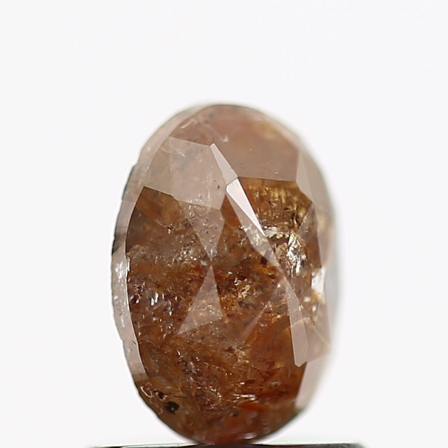 0.71 Carat Oval Red Salt and Pepper Diamond 6.8 MM