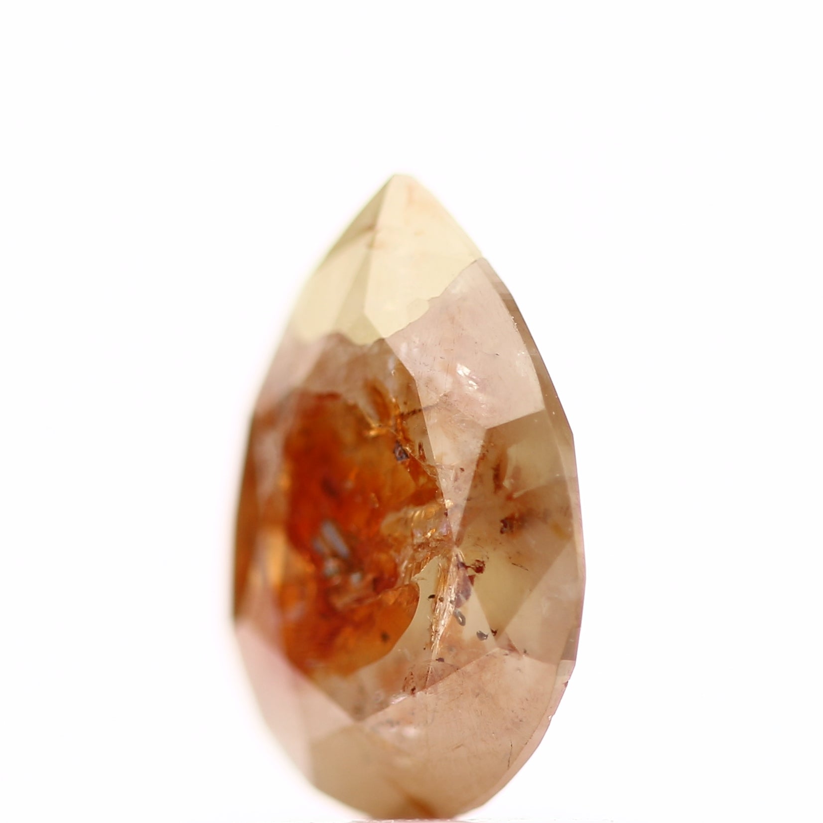 0.79 Carat Pear Salt and Pepper Orange Diamond 7.47 MM