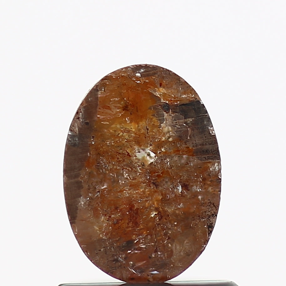 0.71 Carat Oval Red Salt and Pepper Diamond 6.8 MM