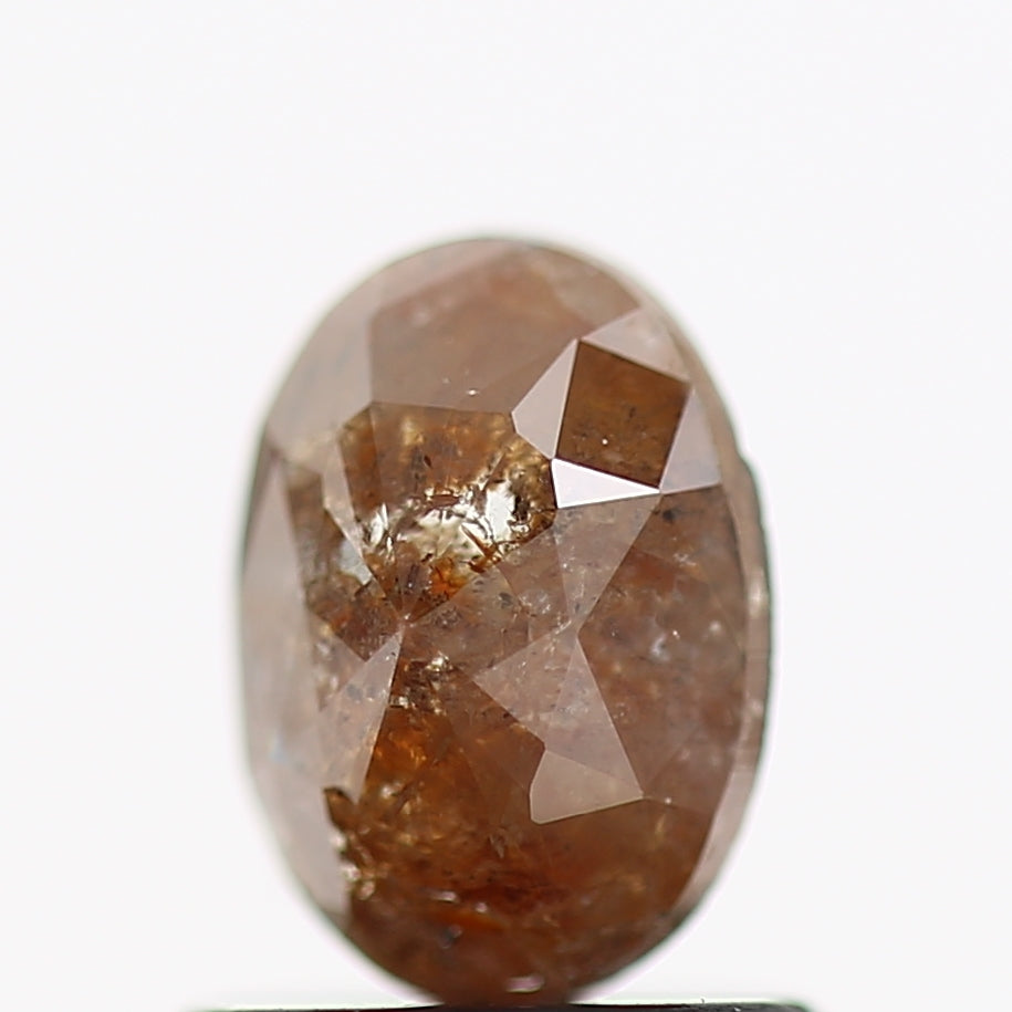 0.71 Carat Oval Red Salt and Pepper Diamond 6.8 MM