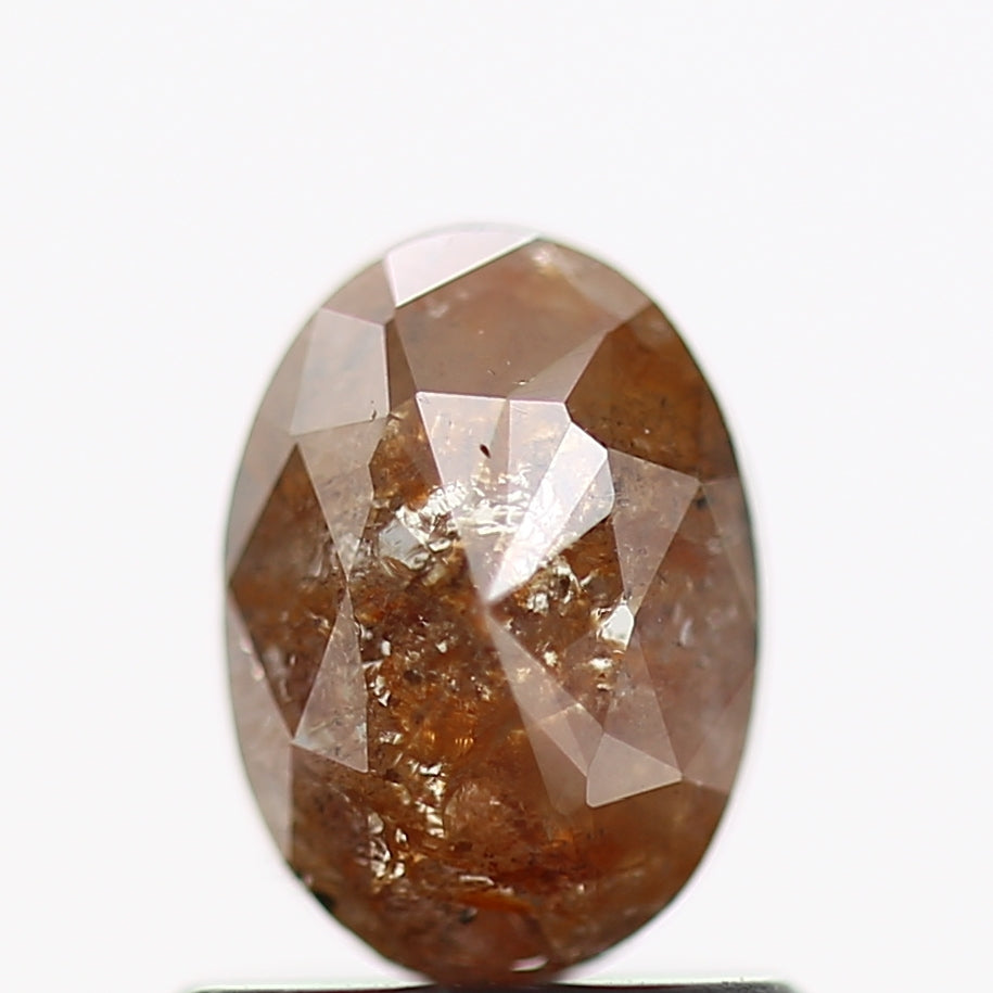 0.71 Carat Oval Red Salt and Pepper Diamond 6.8 MM