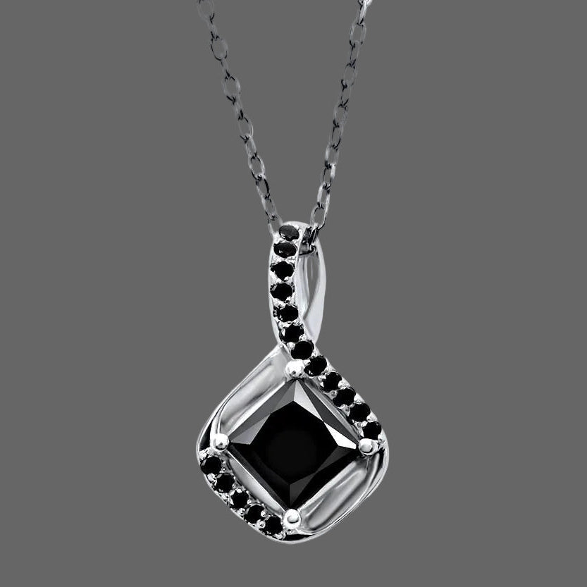 Black diamond pendant on a chain against a white background
