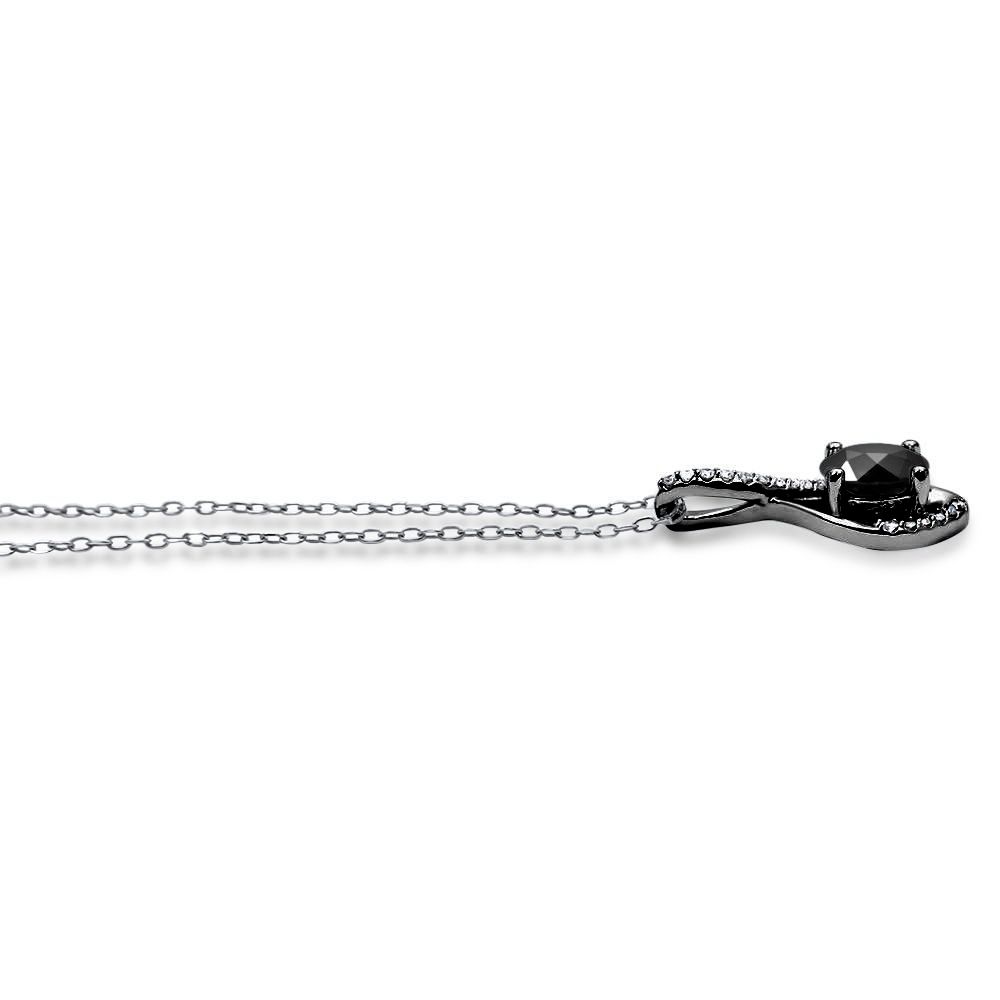 Necklace with a black gemstone pendant on a white background