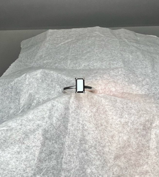 Black_diamond_solitaire_ring-emerald_shape_platinum