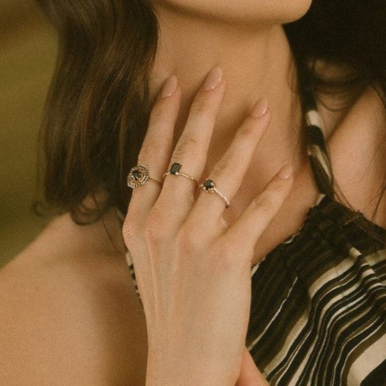 Black_diamond_solitaire_ring-emerald_wedding-band-platinum