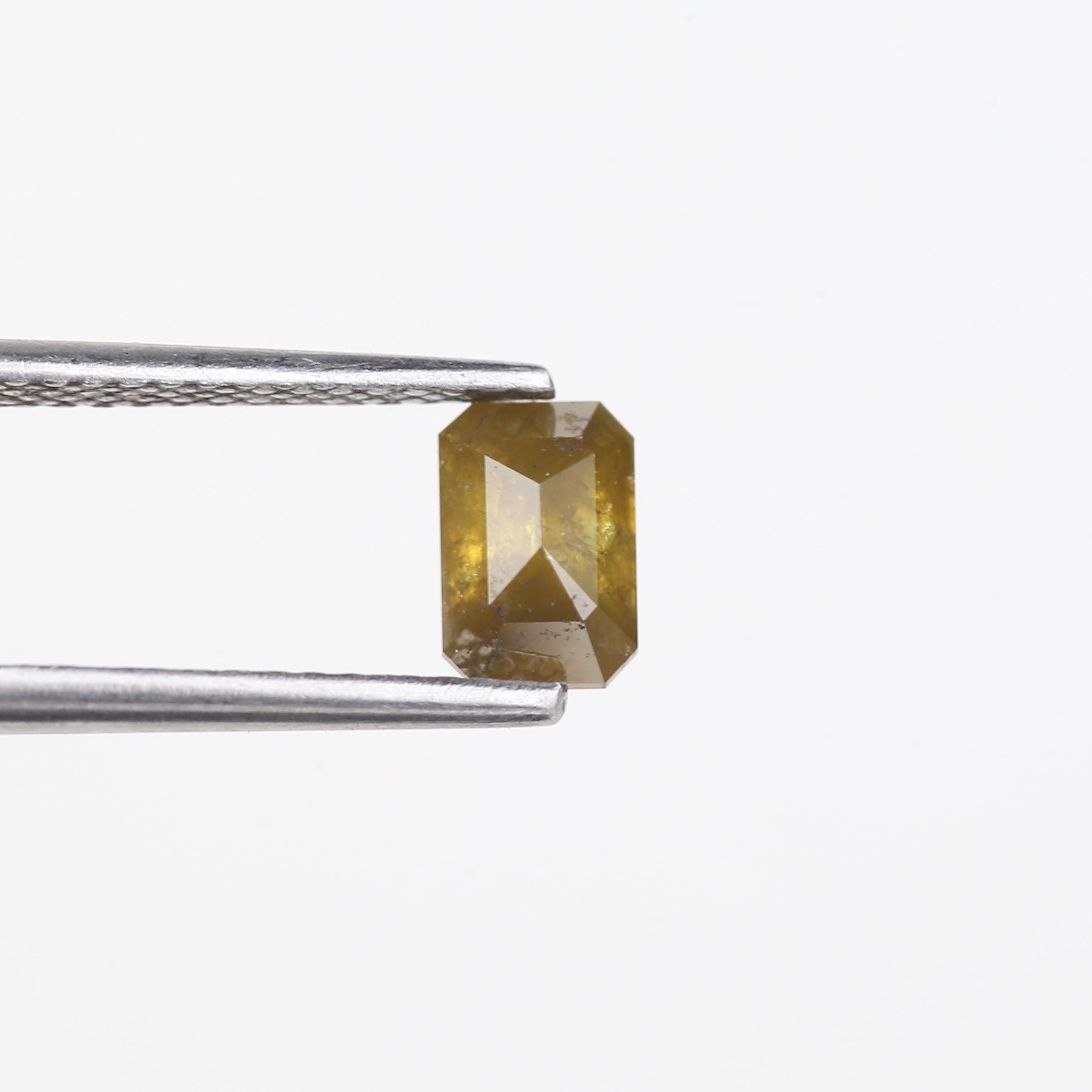 0.72 Carat Natural Yellow Emerald Cut Salt And Pepper Diamond 6.16 MM