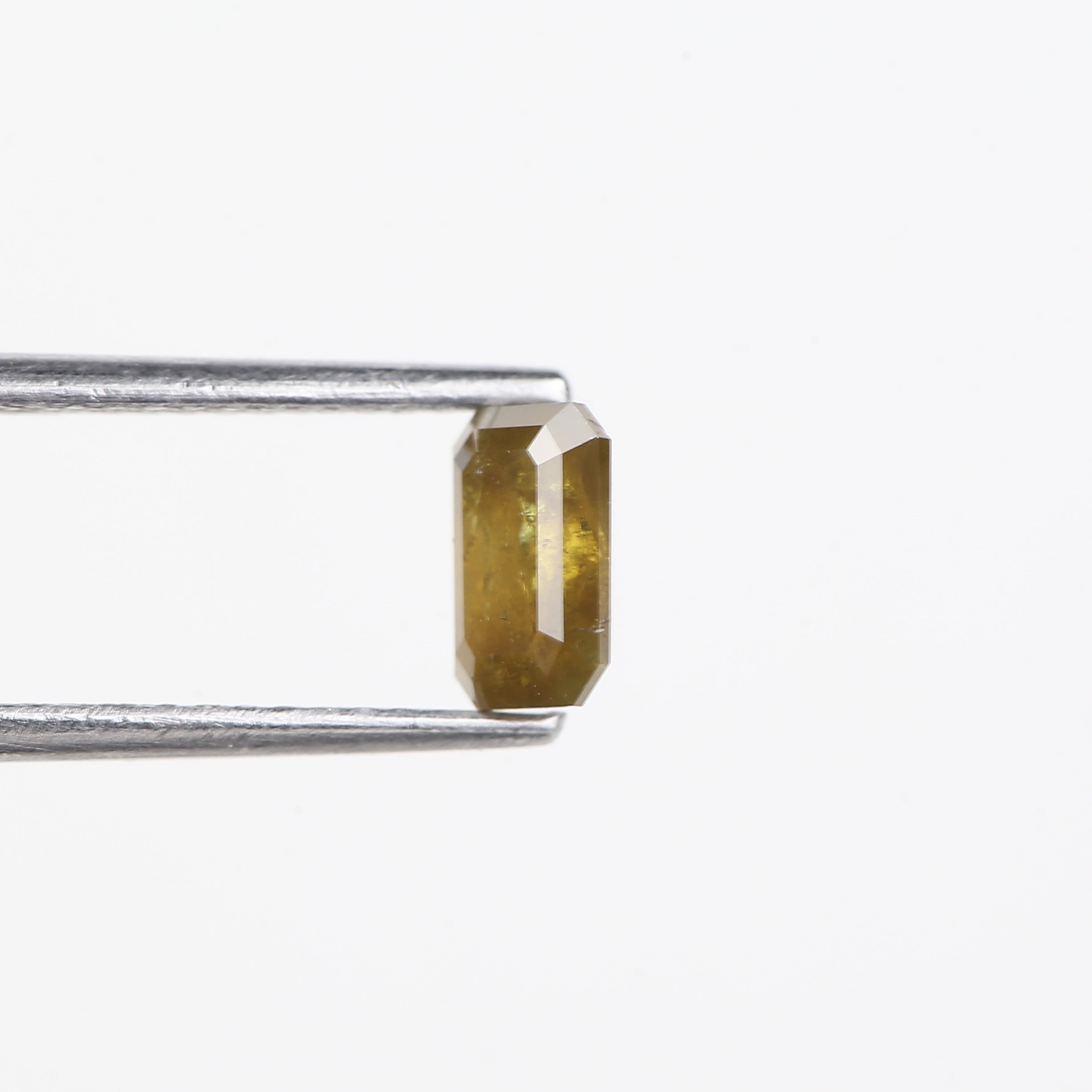 0.72 Carat Natural Yellow Emerald Cut Salt And Pepper Diamond 6.16 MM