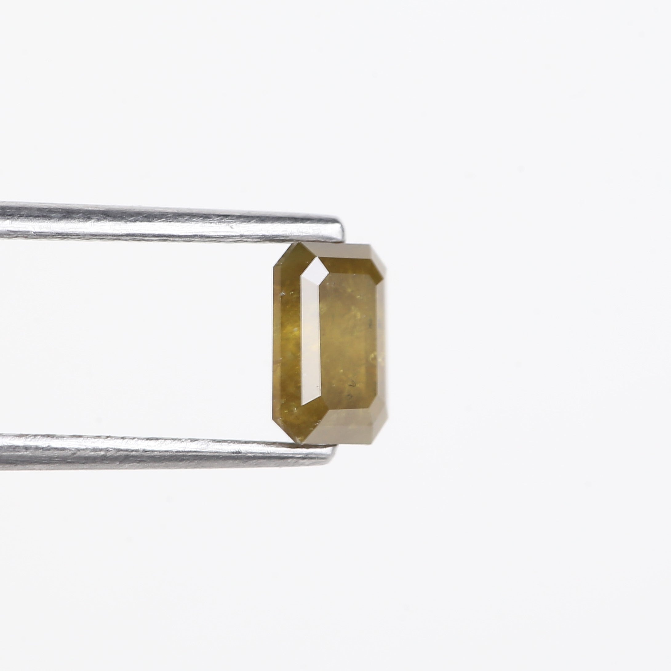 0.72 Carat Natural Yellow Emerald Cut Salt And Pepper Diamond 6.16 MM