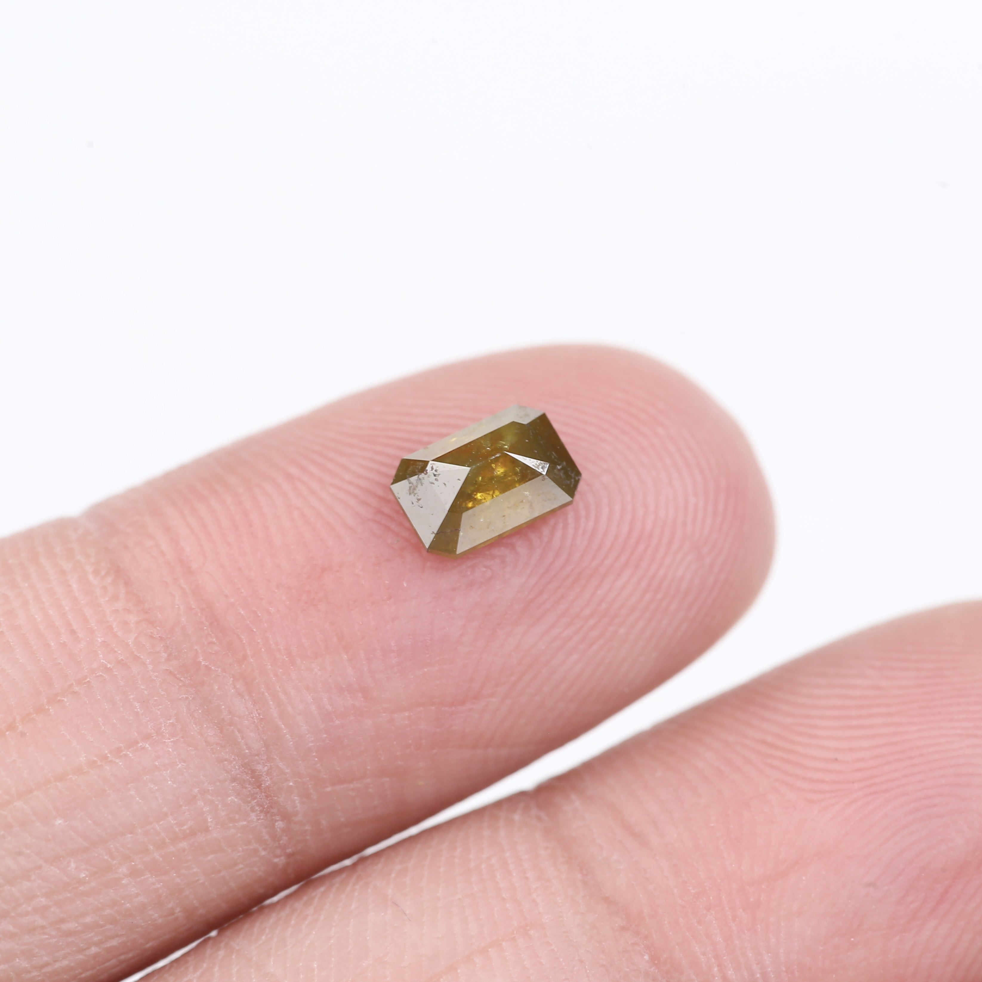 0.72 Carat Natural Yellow Emerald Cut Salt And Pepper Diamond 6.16 MM