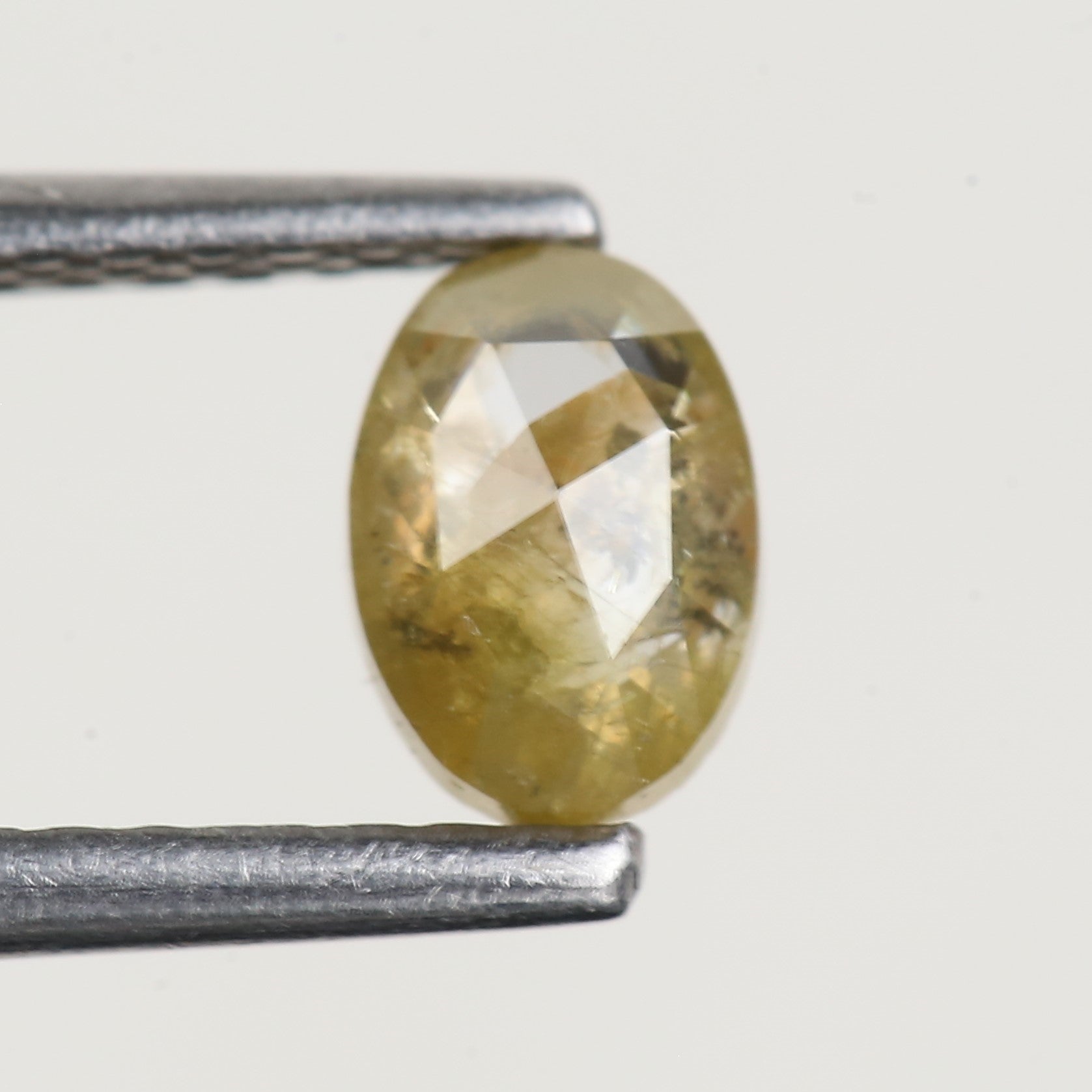 0.43 Ct Oval Salt and Pepper Yellow Natural Diamond 5.6 MM
