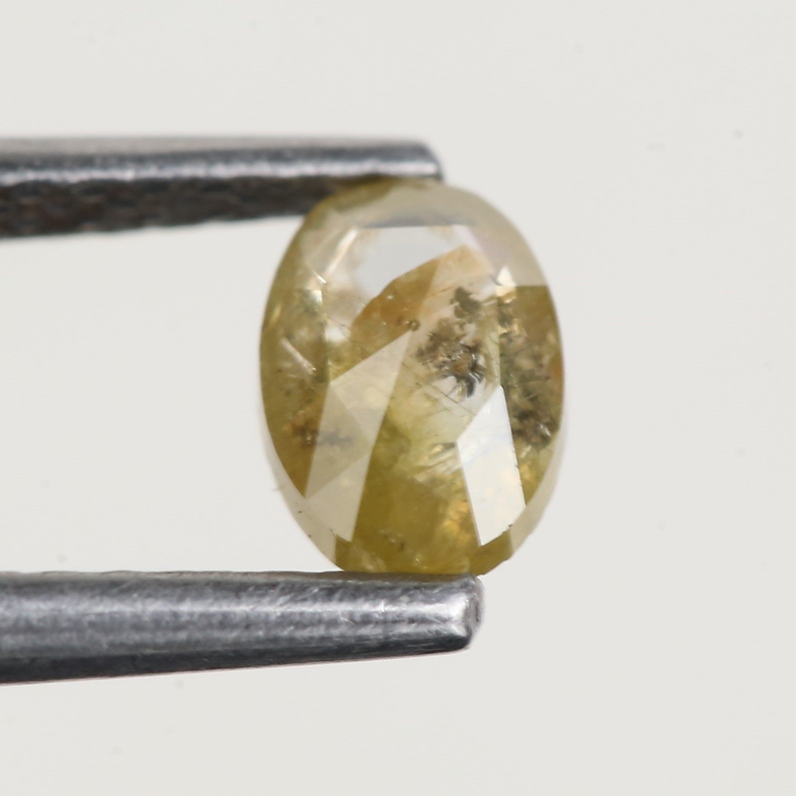 0.43 Ct Oval Salt and Pepper Yellow Natural Diamond 5.6 MM