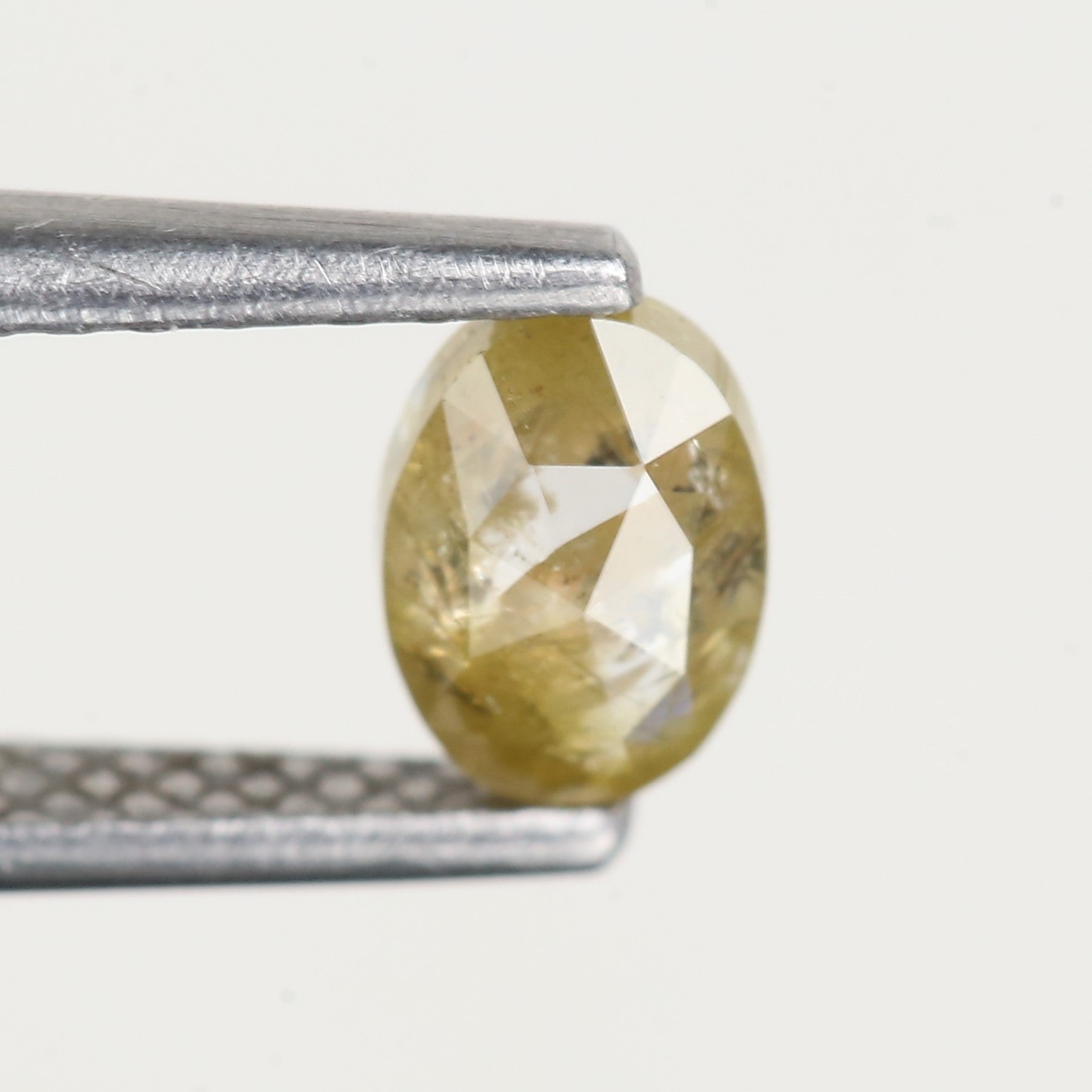 0.43 Ct Oval Salt and Pepper Yellow Natural Diamond 5.6 MM