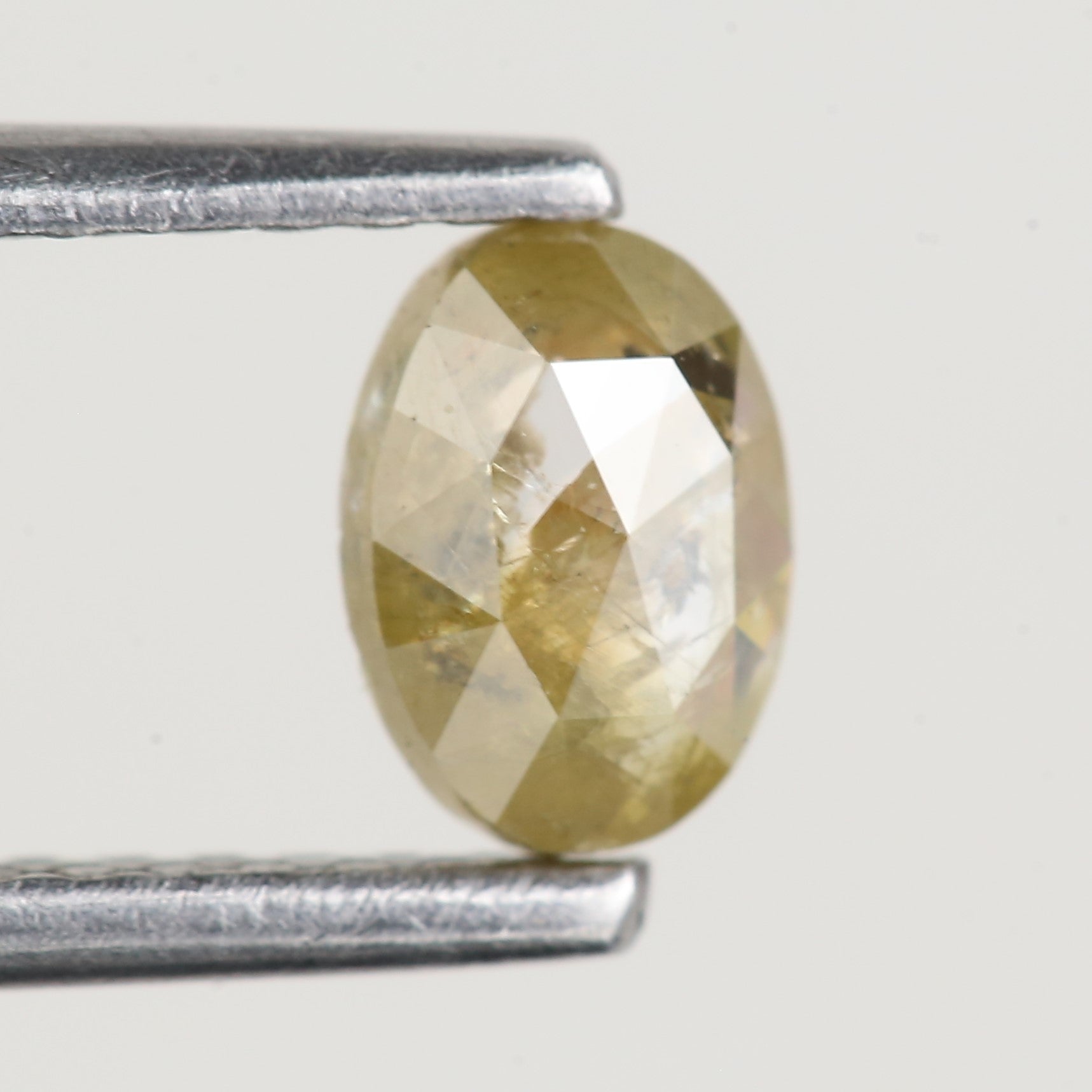 0.43 Ct Oval Salt and Pepper Yellow Natural Diamond 5.6 MM