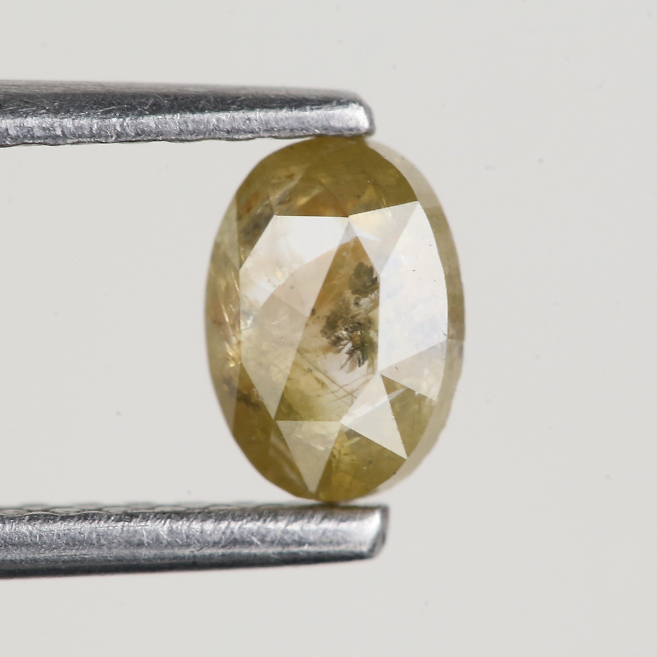 0.43 Ct Oval Salt and Pepper Yellow Natural Diamond 5.6 MM