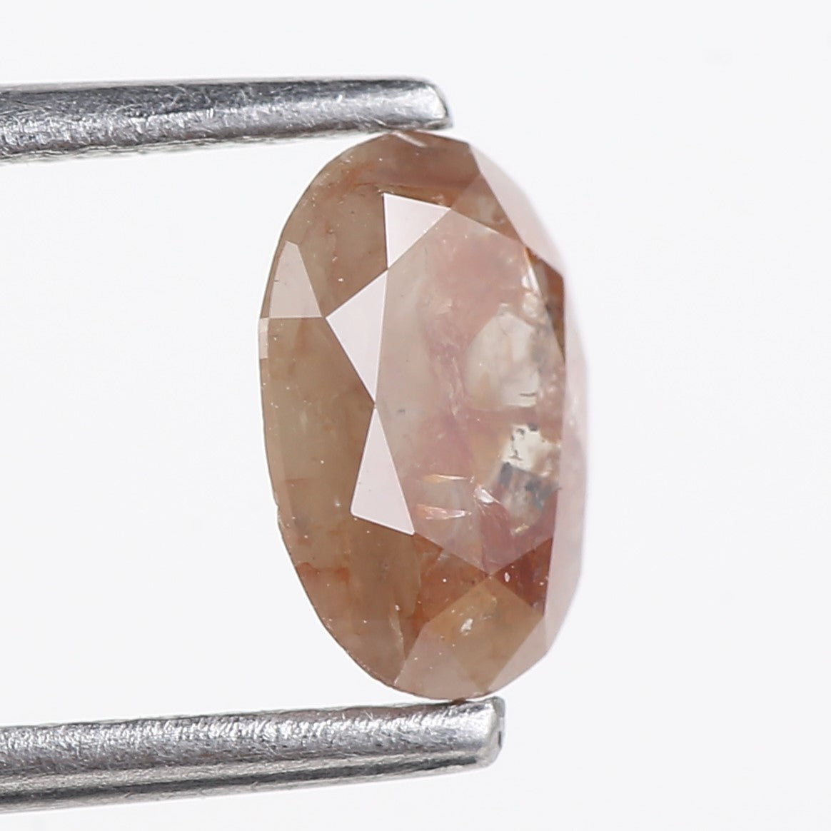 0.76 Carat Natural Orange Oval Cut Salt and Pepper Diamond 7.13 MM