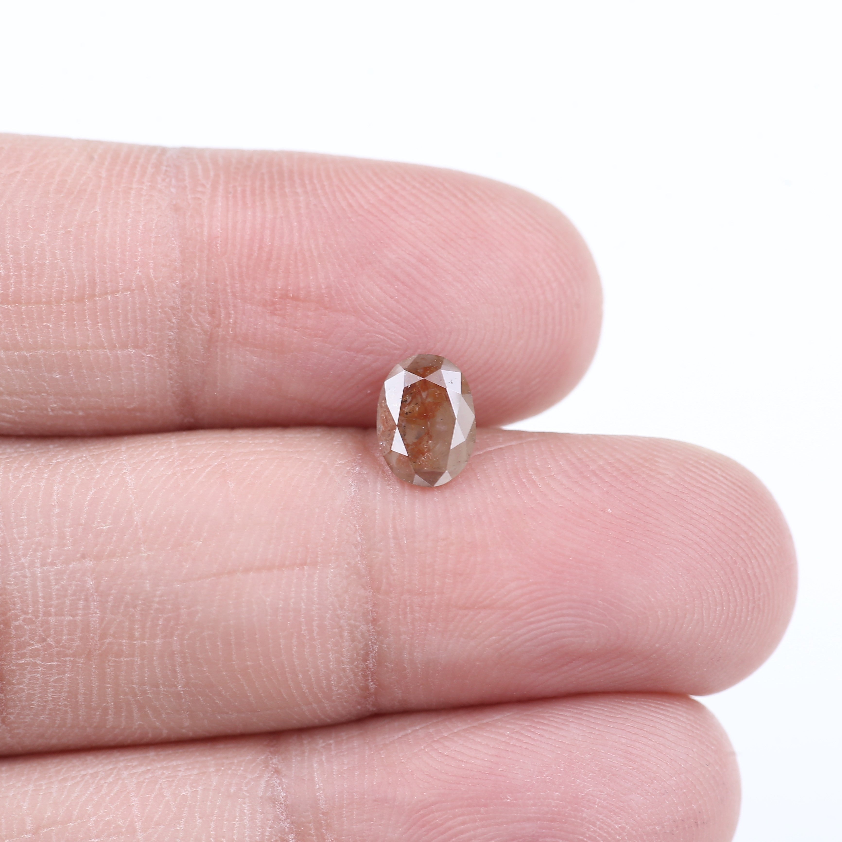 0.76 Carat Natural Orange Oval Cut Salt and Pepper Diamond 7.13 MM