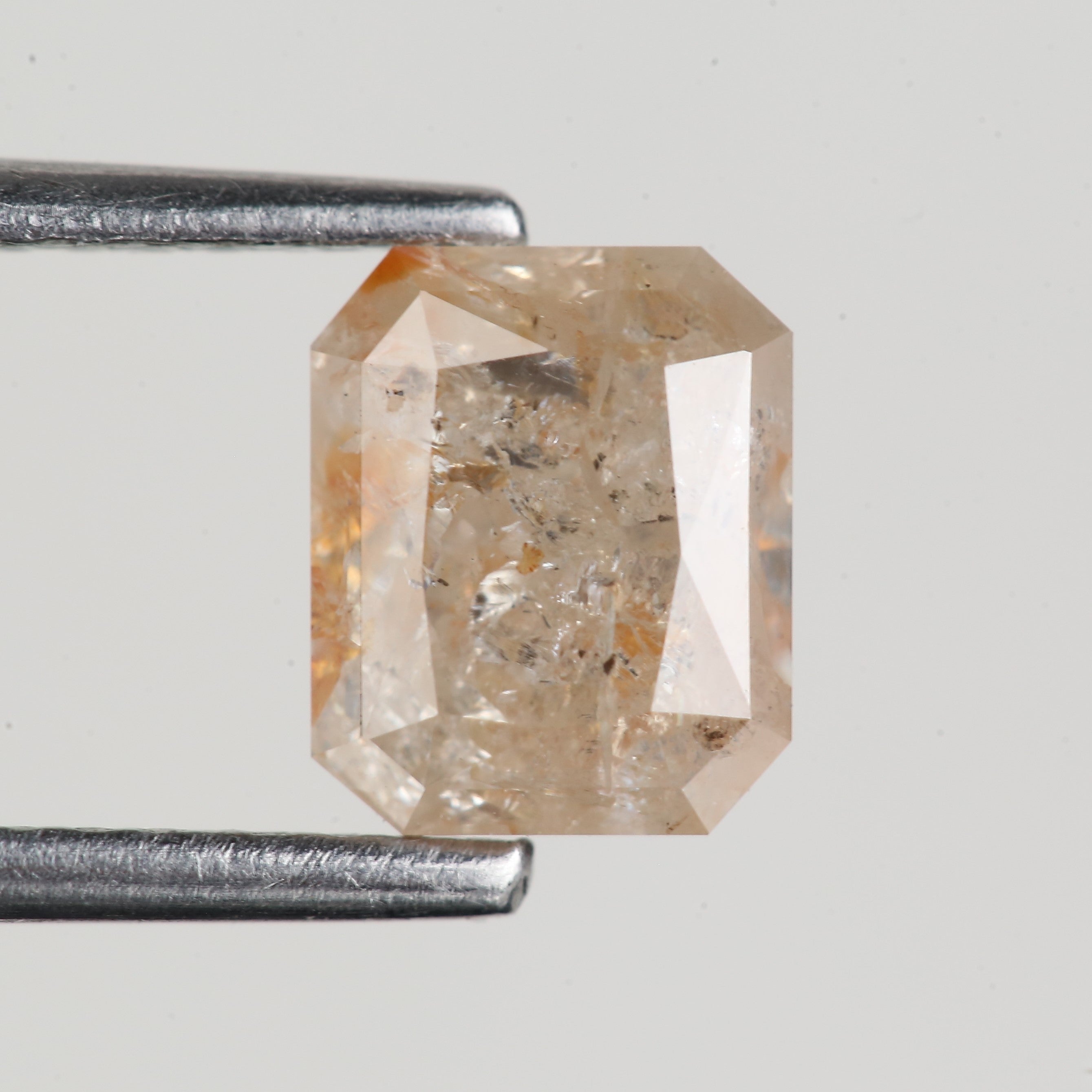 1.34 Carat Natural Orange Emerald Cut Salt and Pepper Diamond 6.6 MM