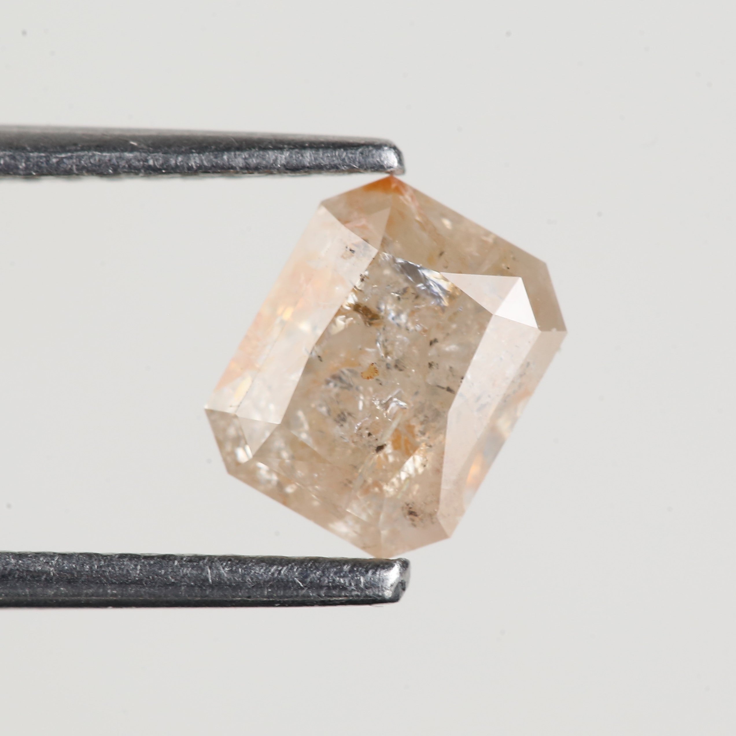 1.34 Carat Natural Orange Emerald Cut Salt and Pepper Diamond 6.6 MM