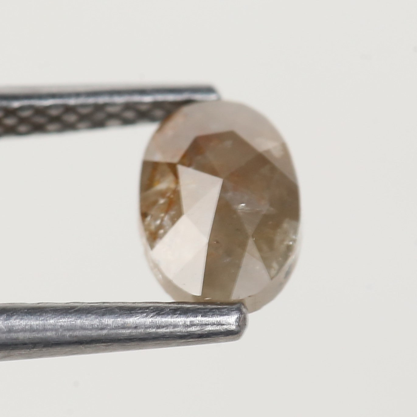 0.55 Carat Oval Rose Cut Salt and Pepper Diamond 6.3 MM