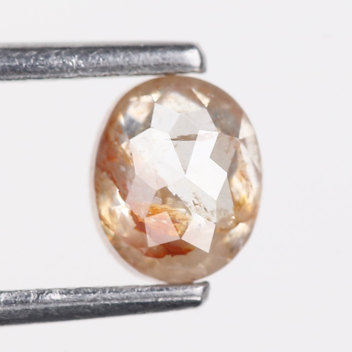 0.69 Carat Natural Orange Salt Pepper Oval Rosecut Diamond 5.62 MM