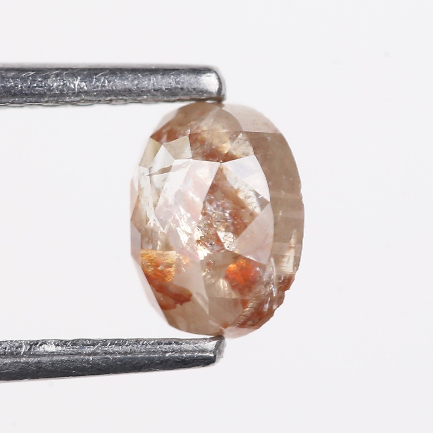 0.69 Carat Natural Orange Salt Pepper Oval Rosecut Diamond 5.62 MM