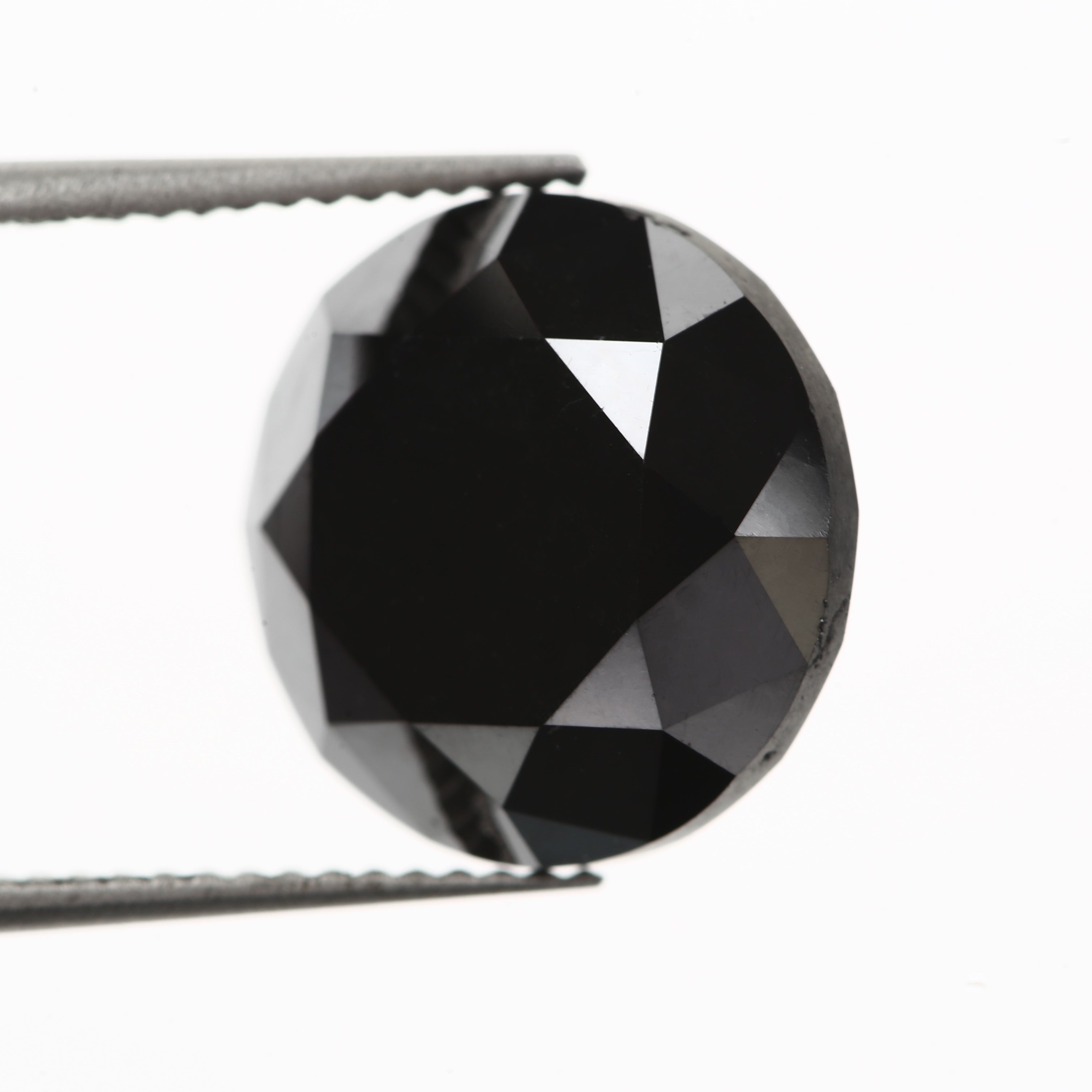 natural round cut black diamond