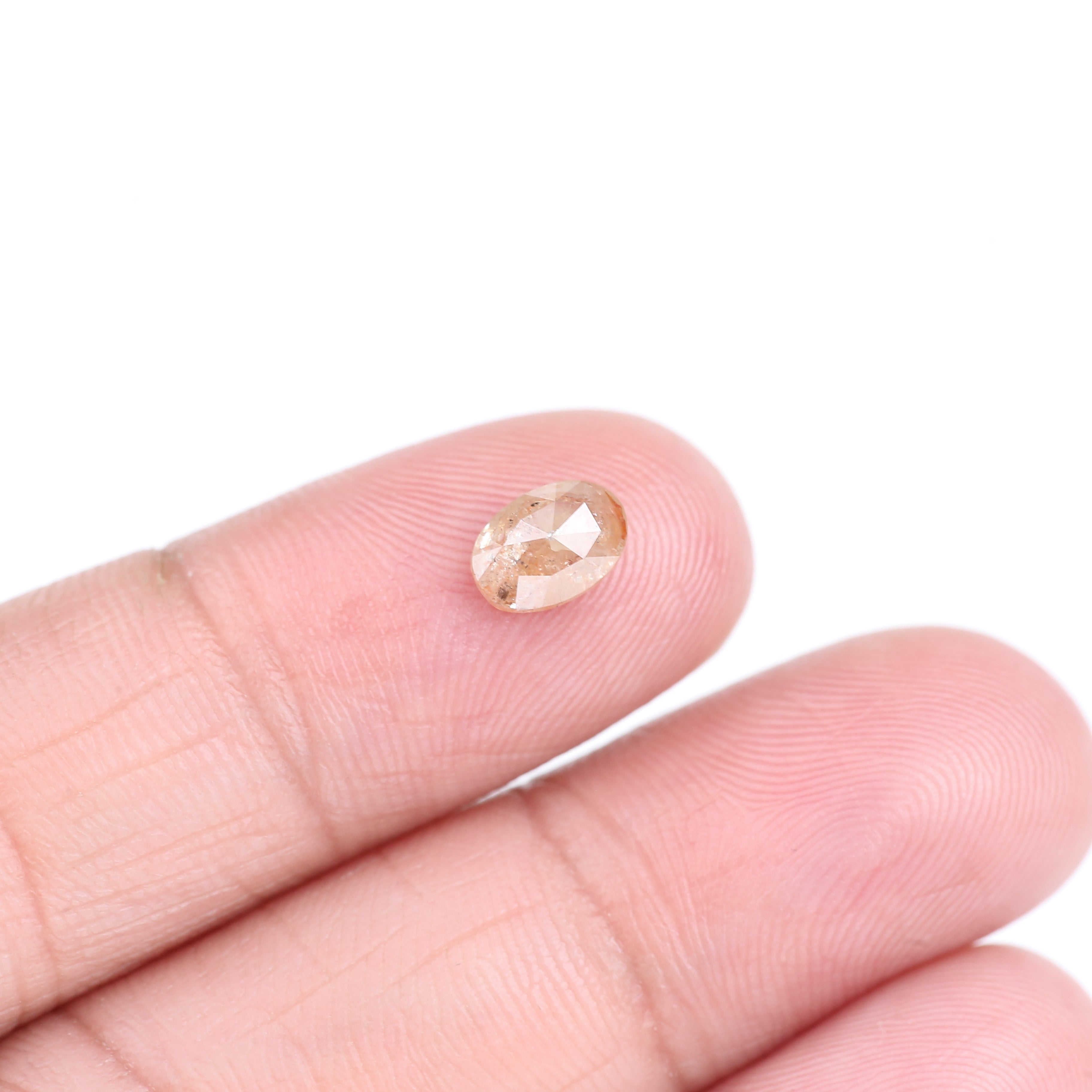 0.91 Carat Natural Light Orange Oval Cut Salt And Pepper Diamond 6.92 MM