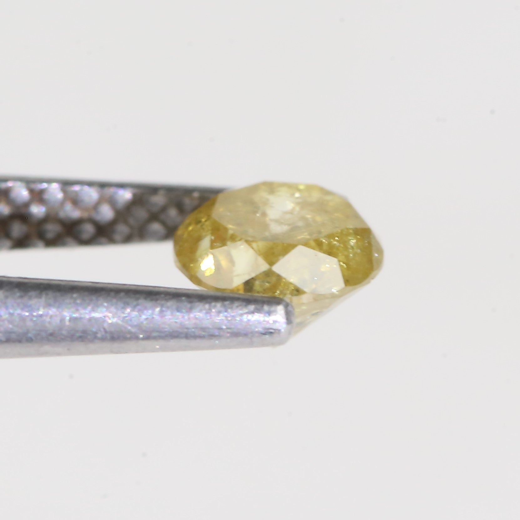 0.59 Carat Natural Salt And Pepper Round Cut Yellow Diamond 4.97 MM