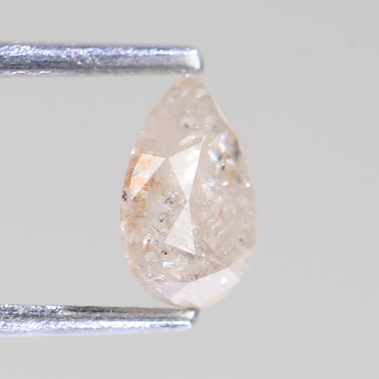 1.12 Carat Natural Pear Light Peach Salt And Pepper Diamond 7.31 MM