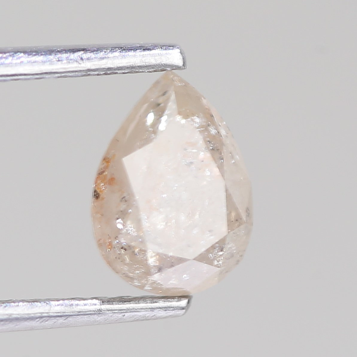 1.12 Carat Natural Pear Light Peach Salt And Pepper Diamond 7.31 MM