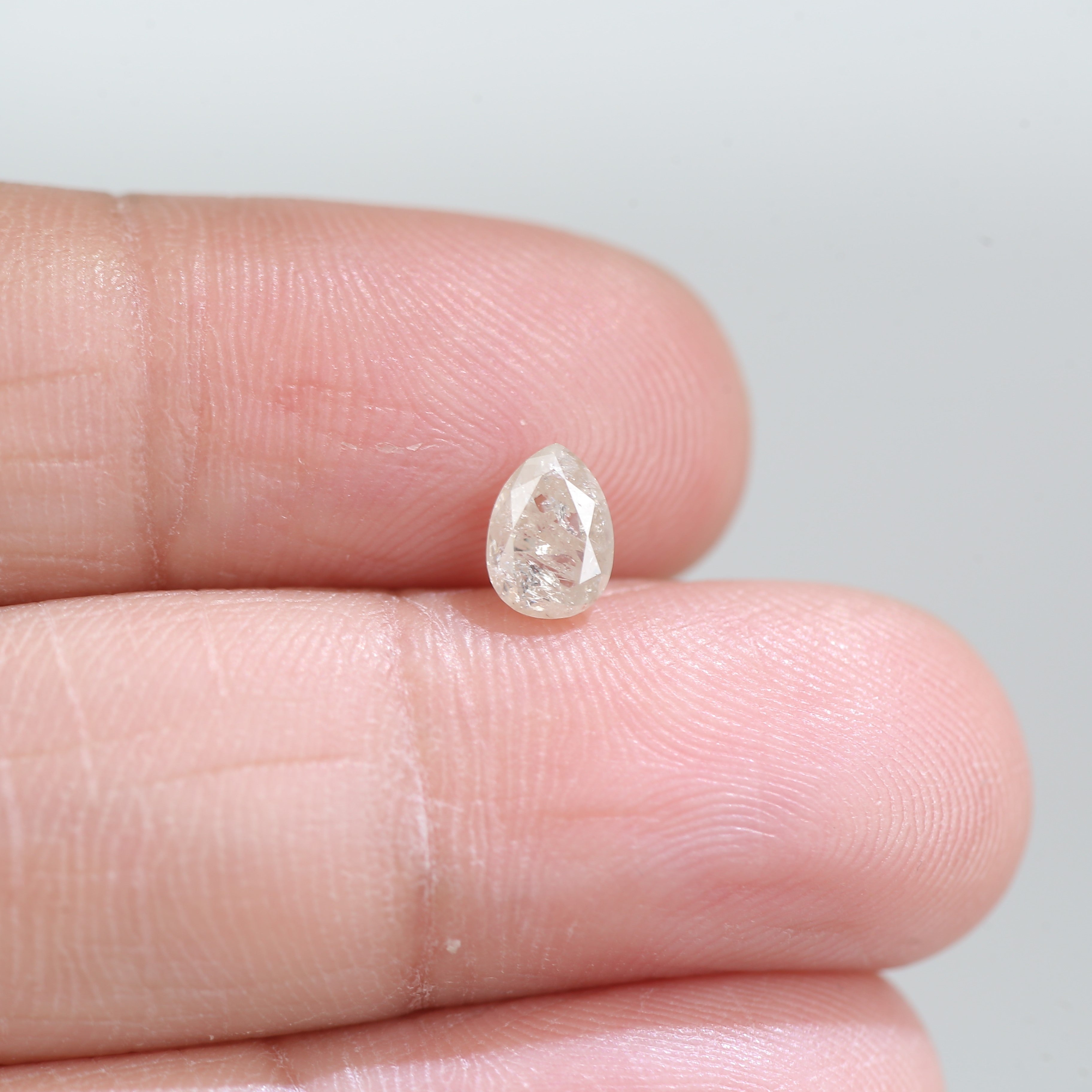 0.66 Carat Natural Salt And Pepper Pear Cut Loose Diamond 6.15 MM