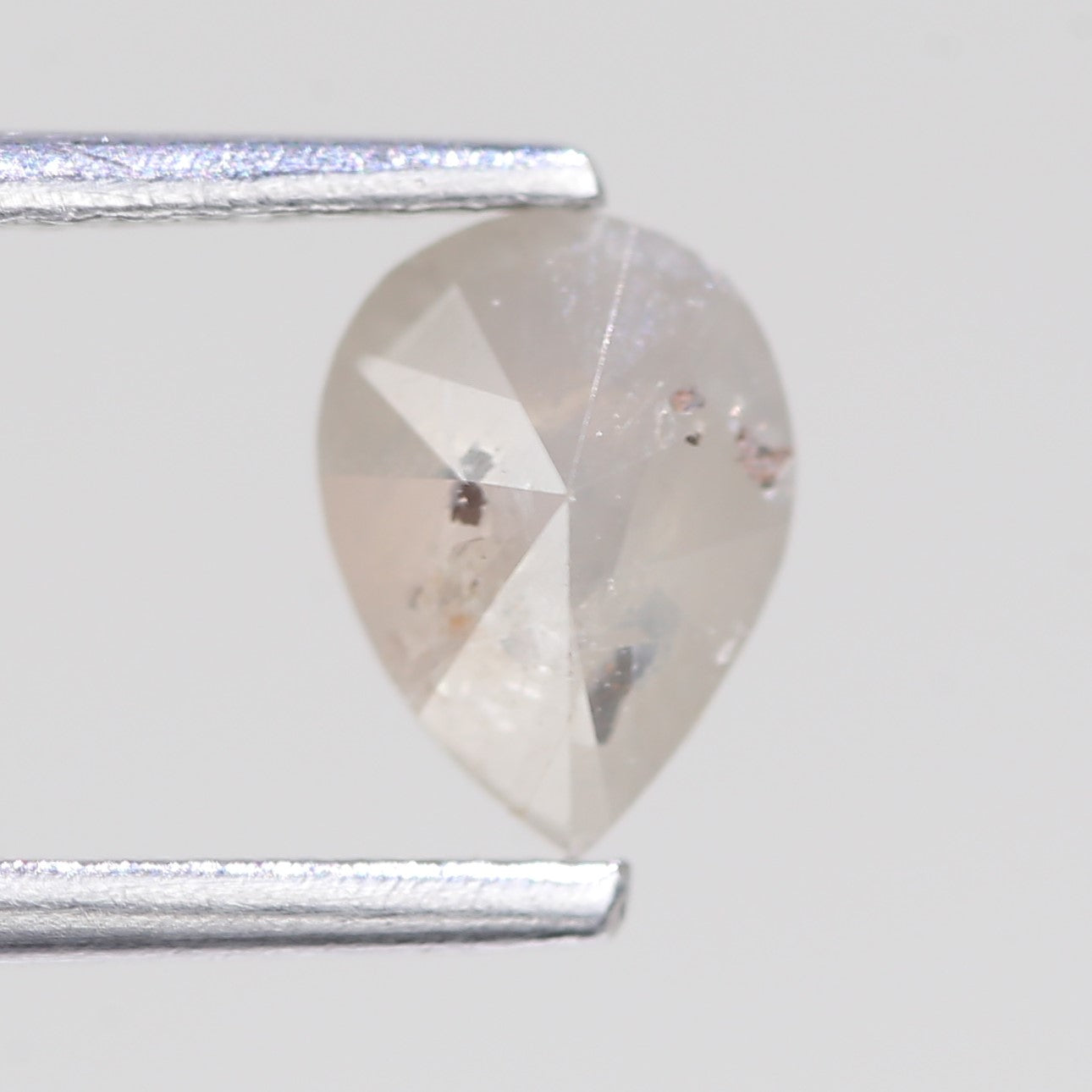 0.76 Carat Natural Icy Grey Pear Salt And Pepper Diamond 6.82 MM