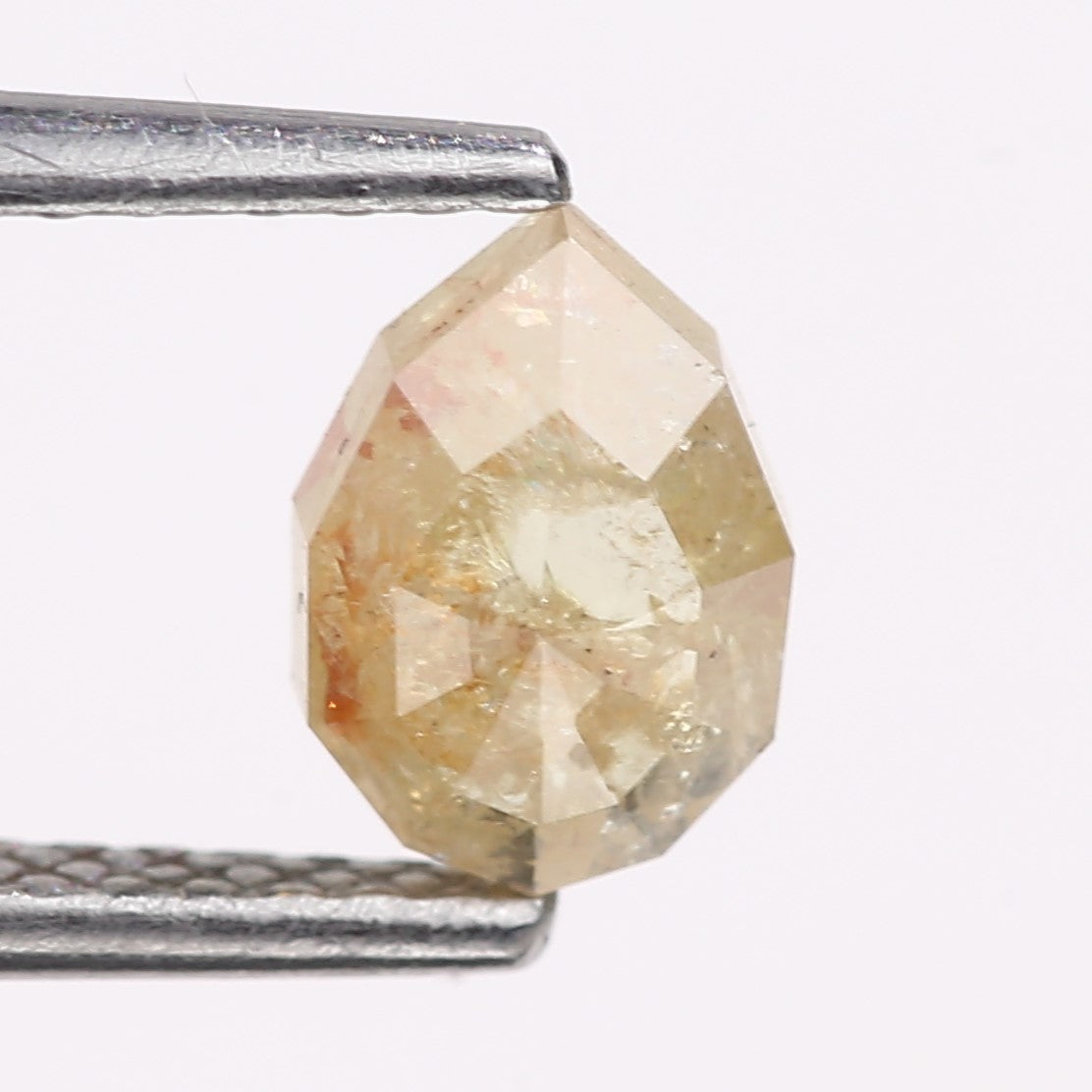 0.74 Carat Natural Light Yellow Pear Cut Salt And Pepper Diamond 6.78 MM