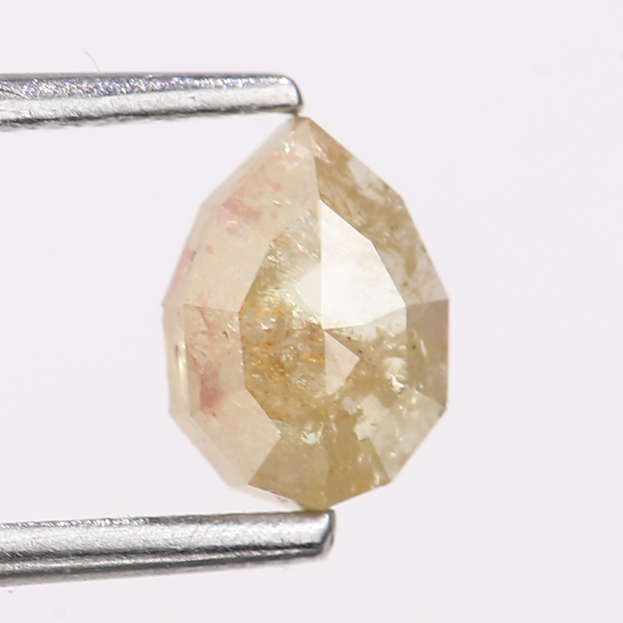 0.74 Carat Natural Light Yellow Pear Cut Salt And Pepper Diamond 6.78 MM