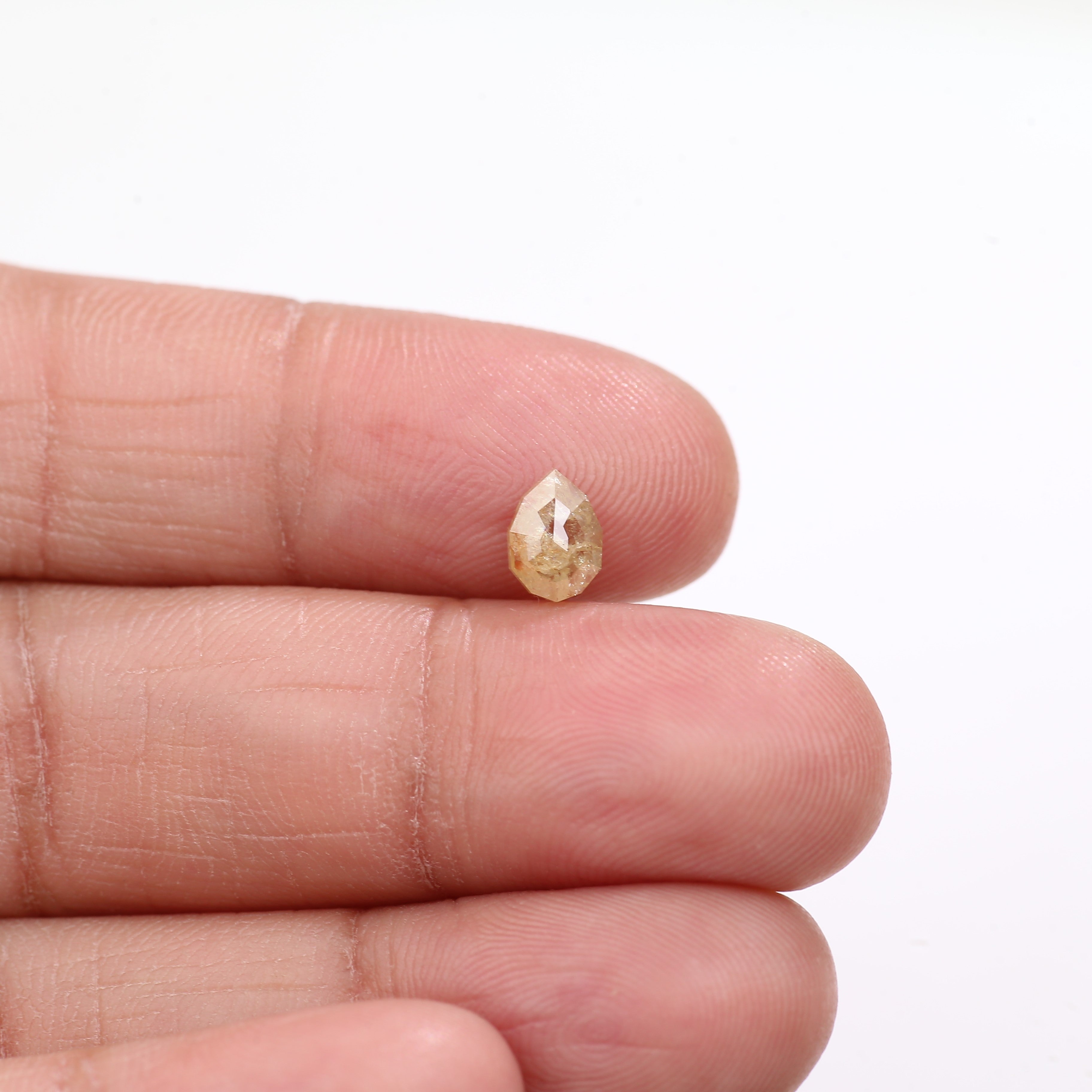 0.74 Carat Natural Light Yellow Pear Cut Salt And Pepper Diamond 6.78 MM