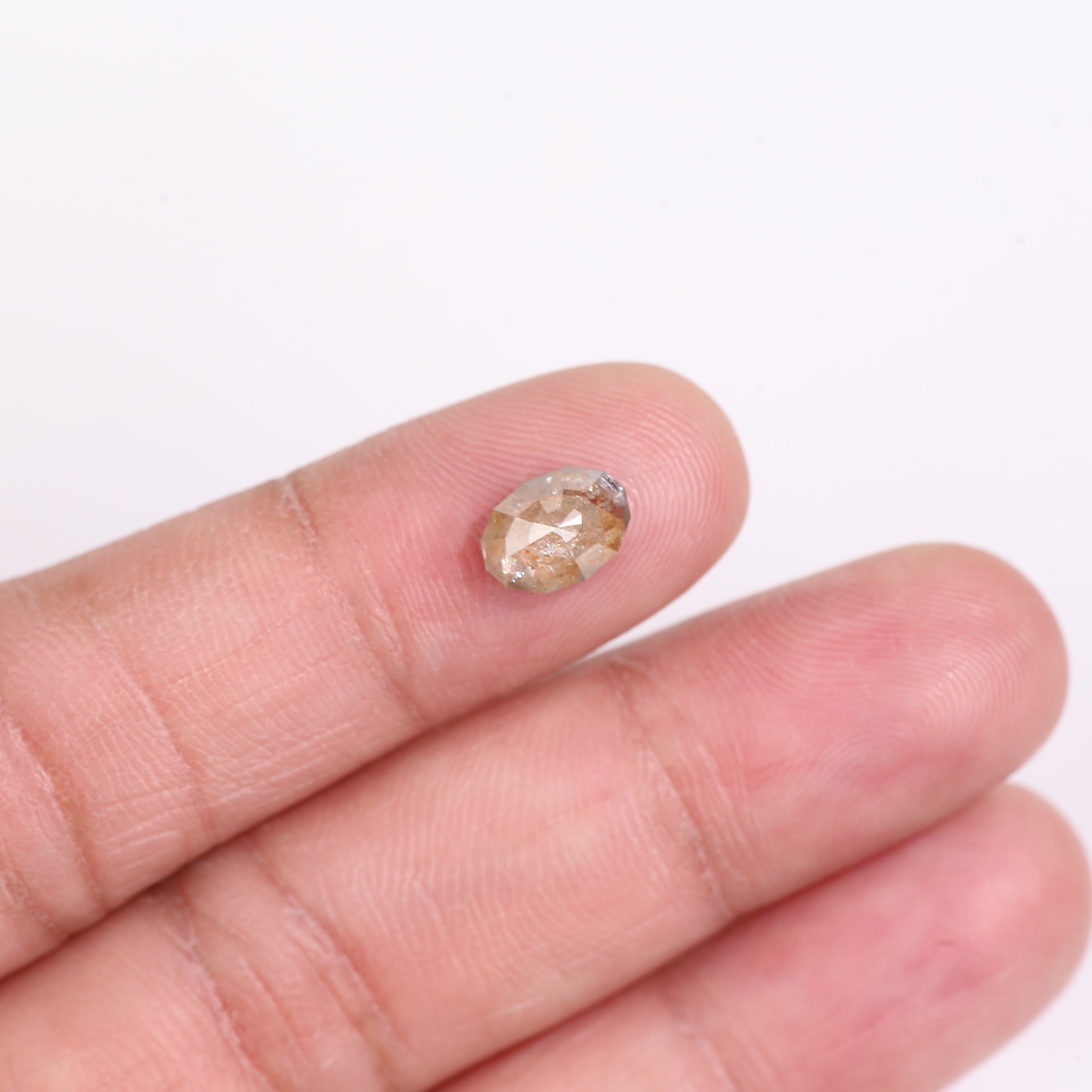 1.83 Carat Natural Orange Oval Cut Salt And Pepper Diamond 8.54 MM