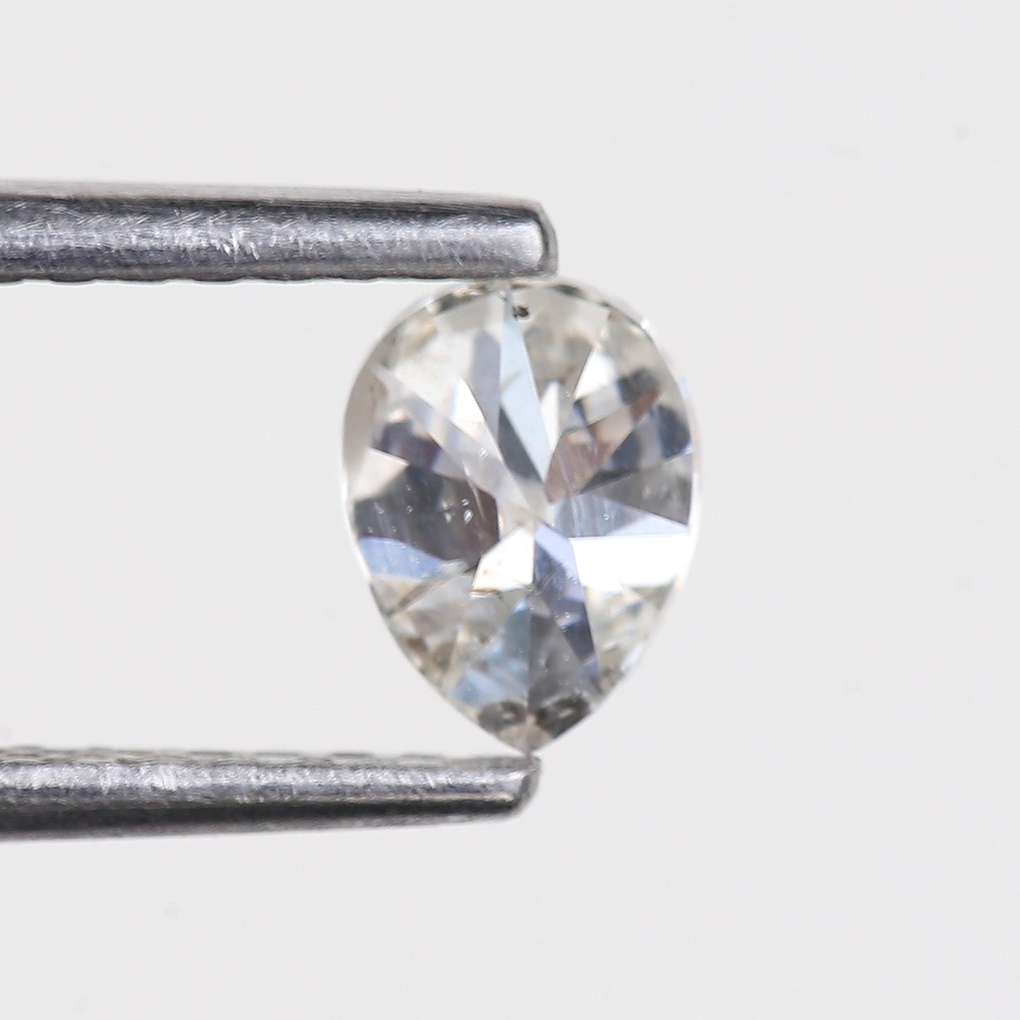 0.49 Carat Natural Pear Salt and Pepper Diamond 5.35 MM