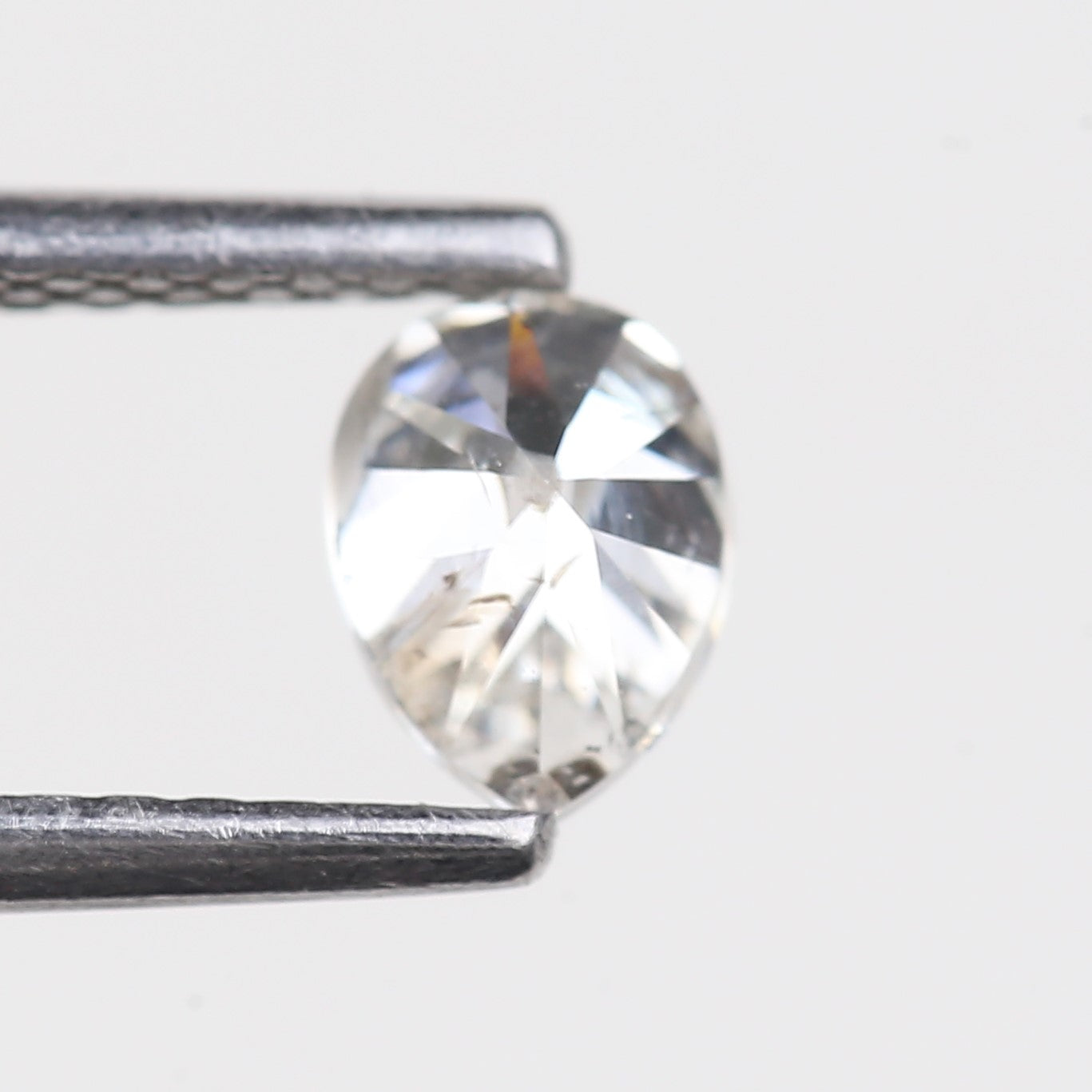 0.49 Carat Natural Pear Salt and Pepper Diamond 5.35 MM