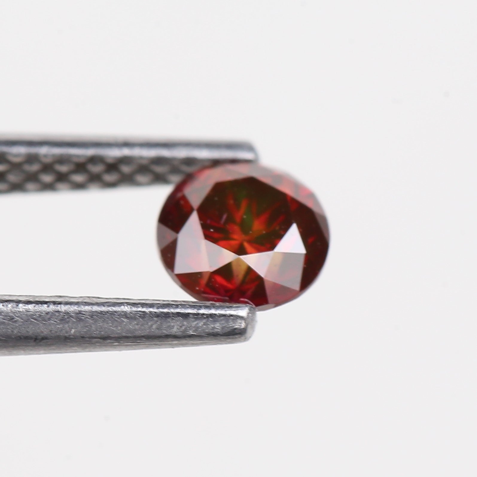 0.32 Carat Natural Fancy Pink Red Salt and Pepper Diamond 4.4 MM
