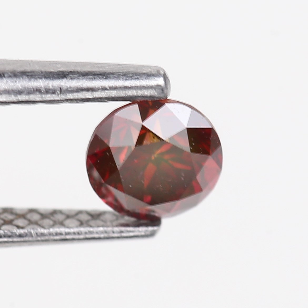 0.32 Carat Natural Fancy Pink Red Salt and Pepper Diamond 4.4 MM
