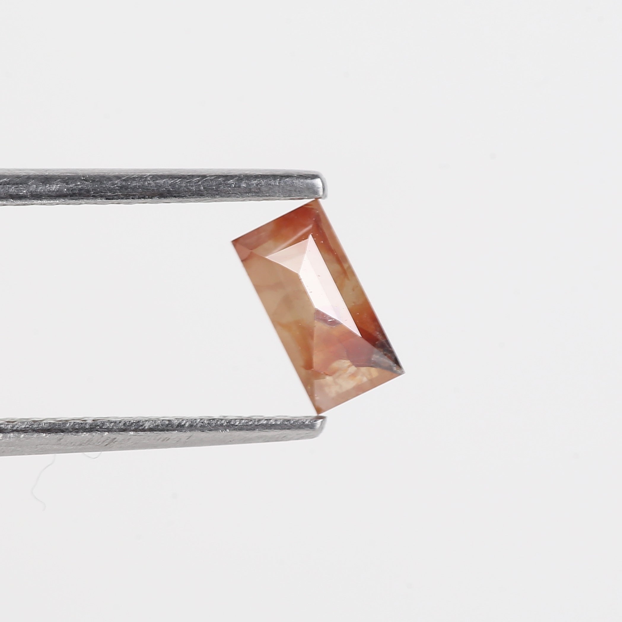 0.44 Carat Natural Orange Baguette Natural Salt And Pepper Diamond 6.07 MM